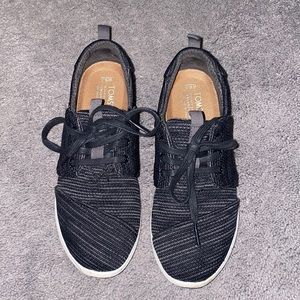 Black Toms sneakers